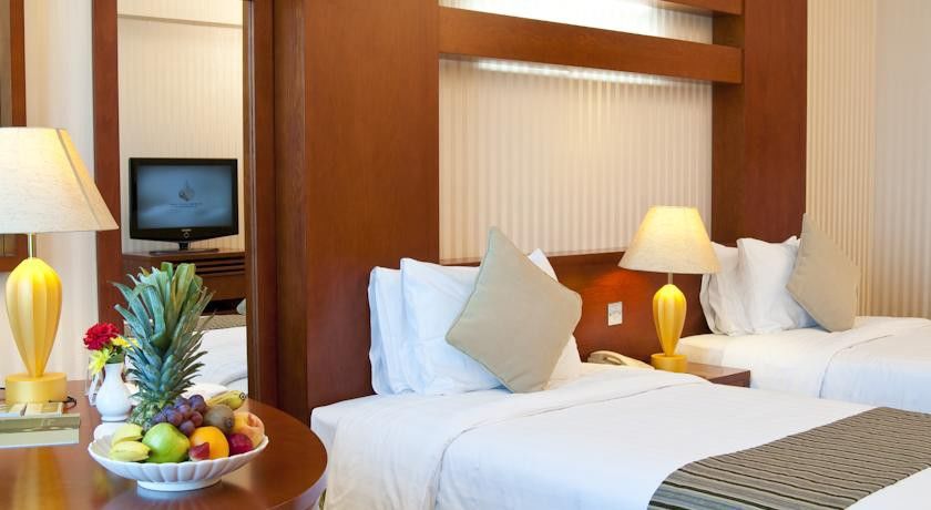 Wiseman Grand Hotel Доха Экстерьер фото A room at the hotel