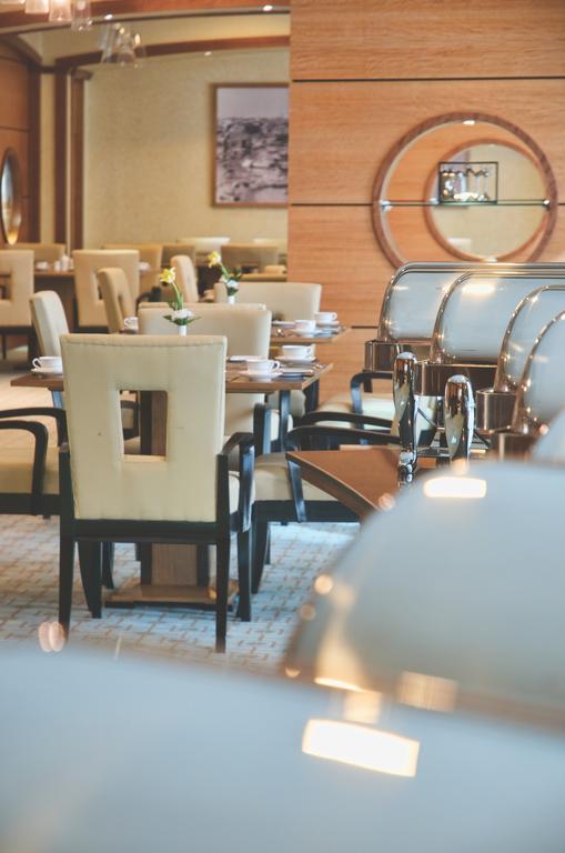Wiseman Grand Hotel Доха Экстерьер фото The interior of the restaurant